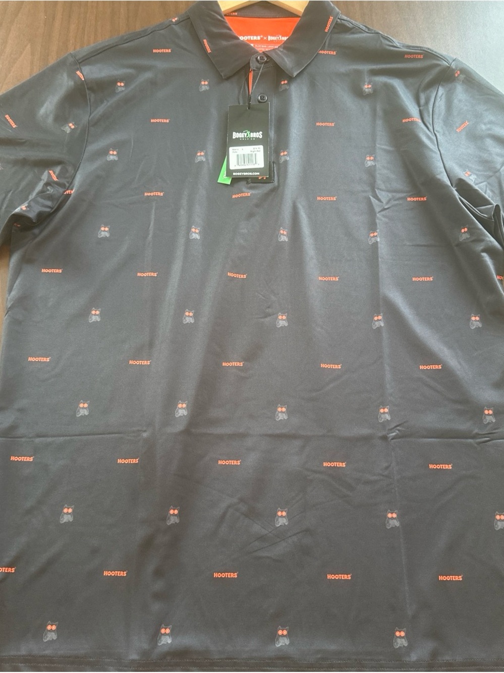 Black Polo Shirt with Orange Logo Pattern - Hooters